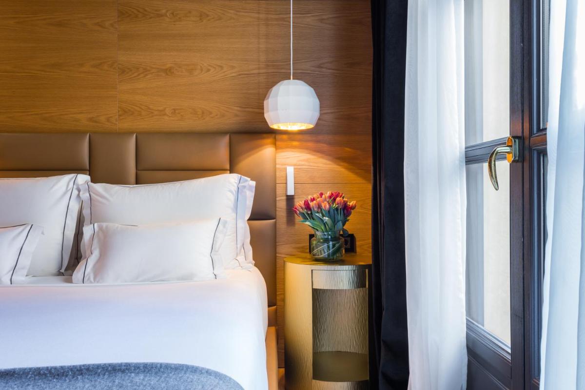 Cama o camas de una habitación en Monument Hotel