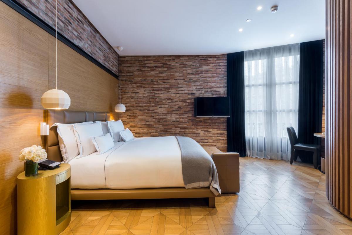 Cama o camas de una habitación en Monument Hotel