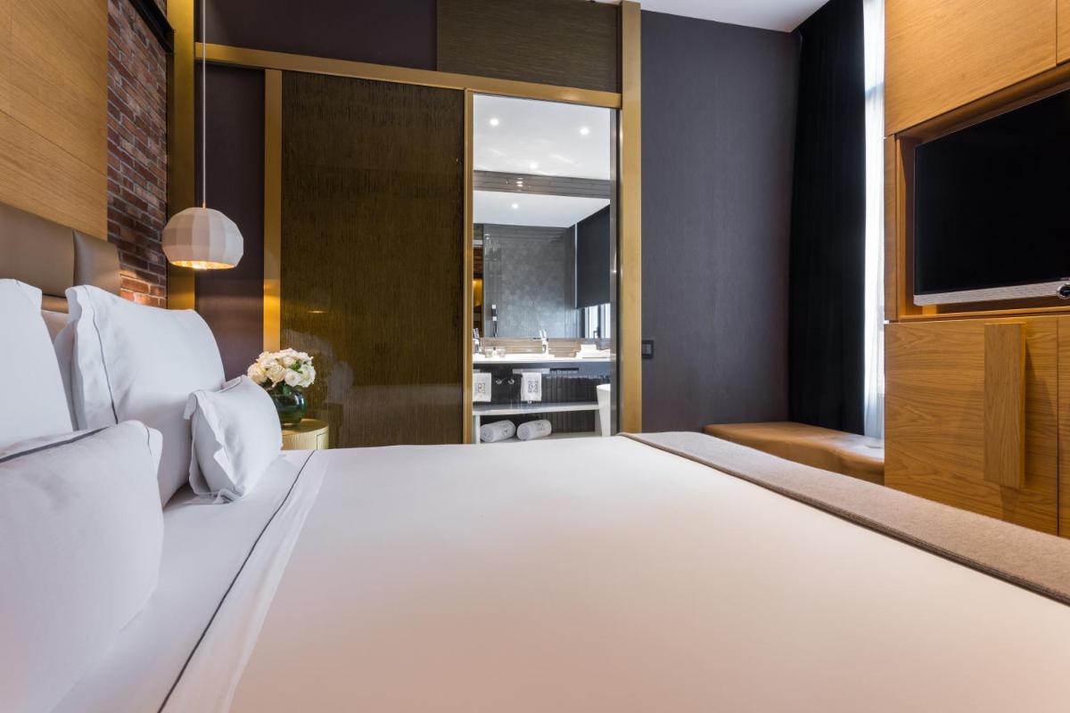 Cama o camas de una habitación en Monument Hotel