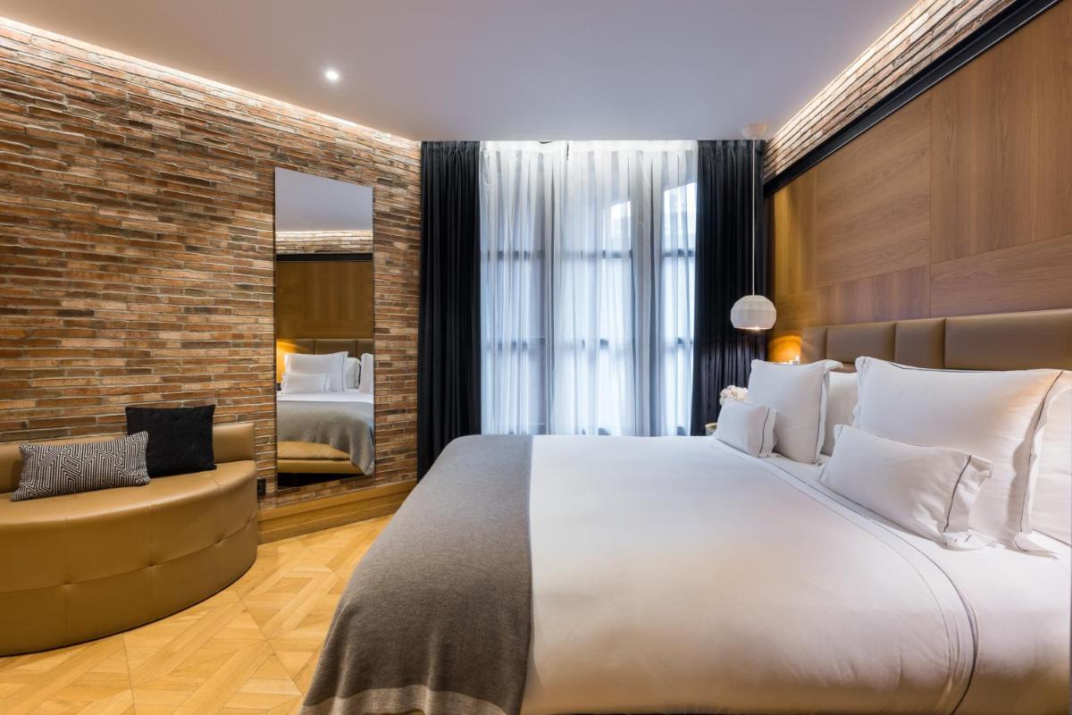 Cama o camas de una habitación en Monument Hotel