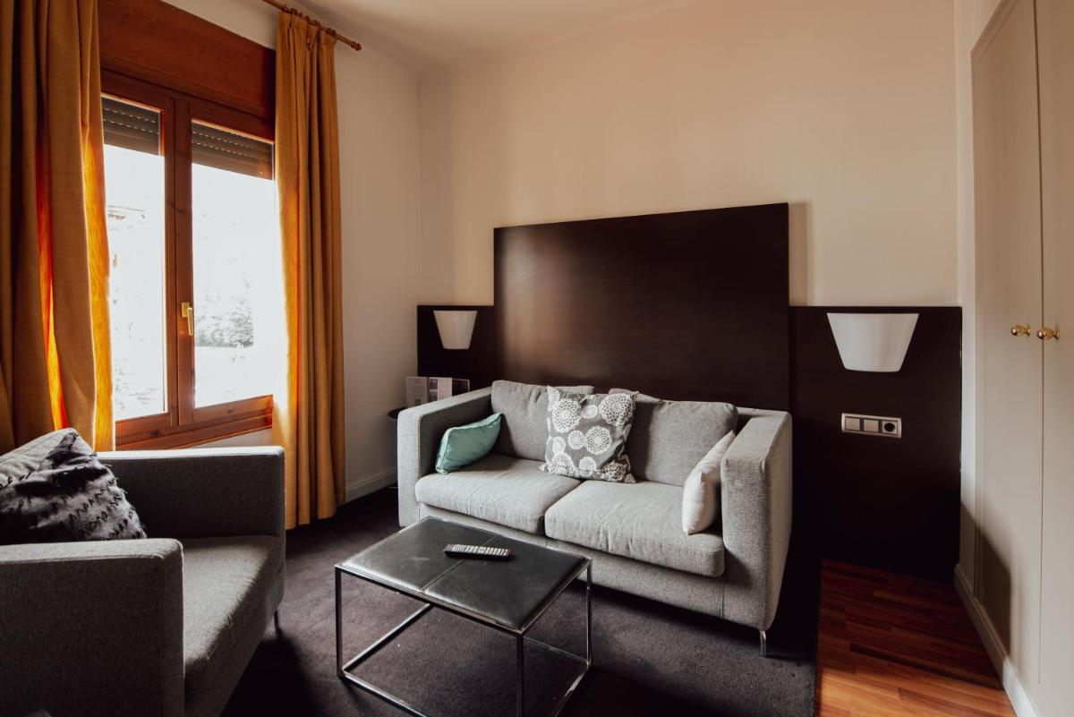 Zona de estar de Hotel Restaurant Pessets & SPA
