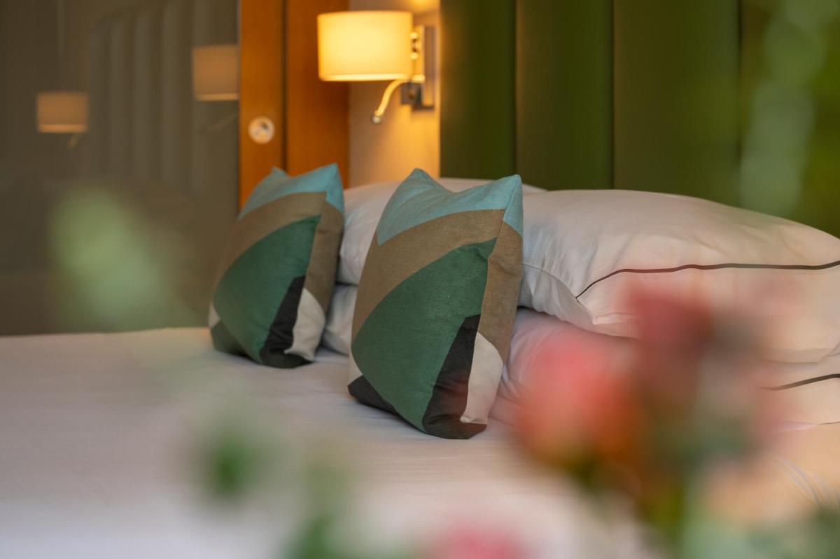 Cama o camas de una habitación en Hesperia Barcelona Sant Just
