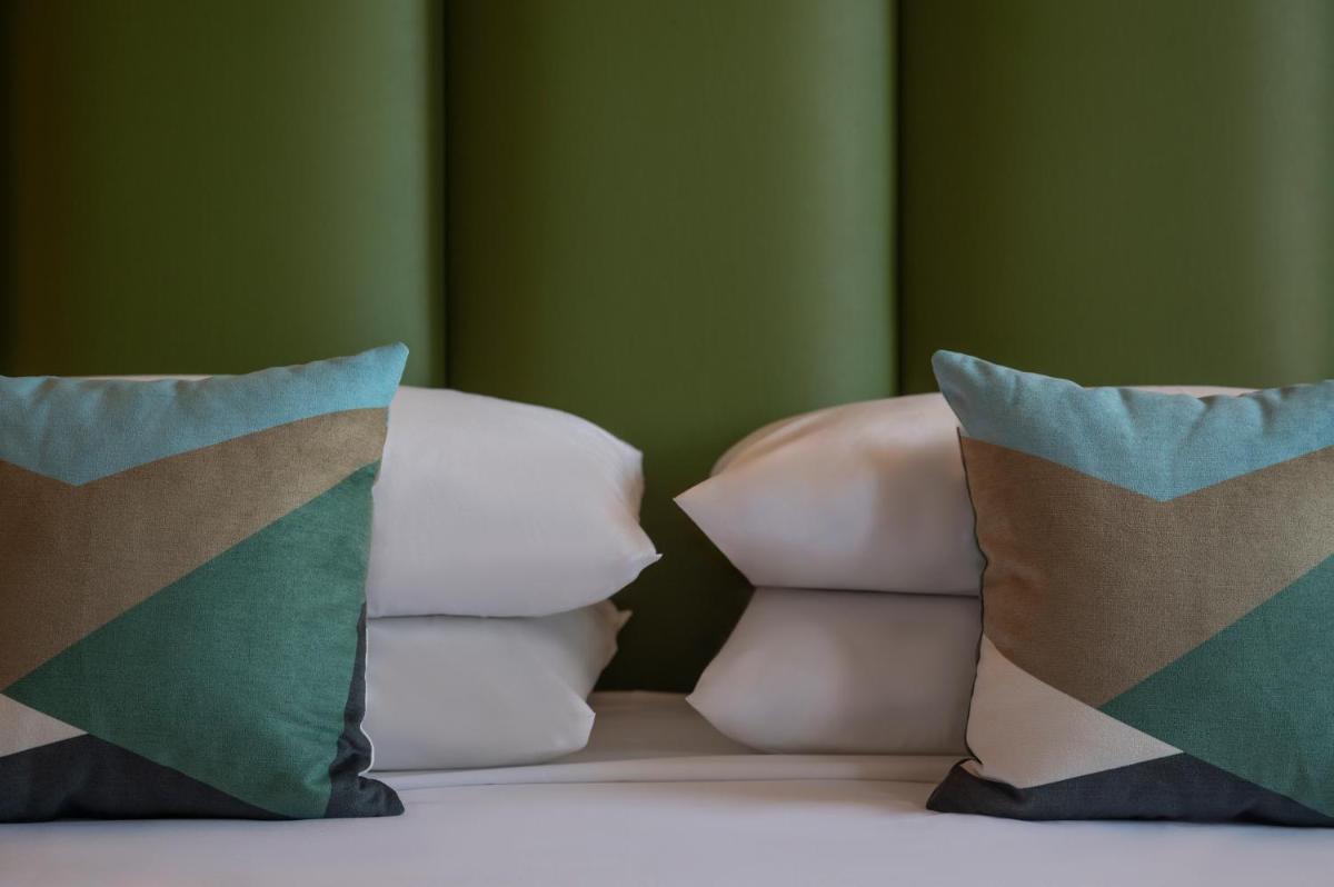 Cama o camas de una habitación en Hesperia Barcelona Sant Just