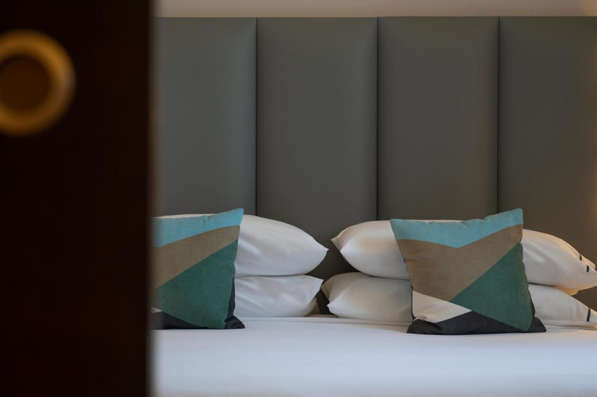 Cama o camas de una habitación en Hesperia Barcelona Sant Just
