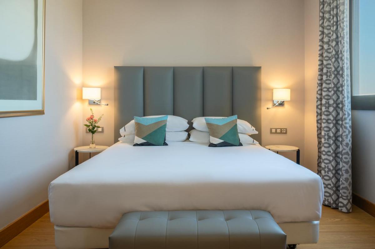 Cama o camas de una habitación en Hesperia Barcelona Sant Just