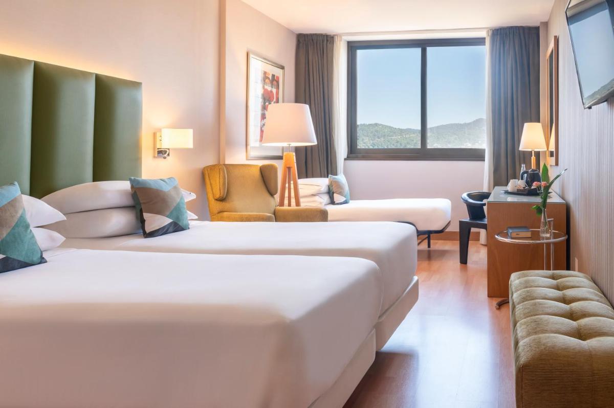 Cama o camas de una habitación en Hesperia Barcelona Sant Just