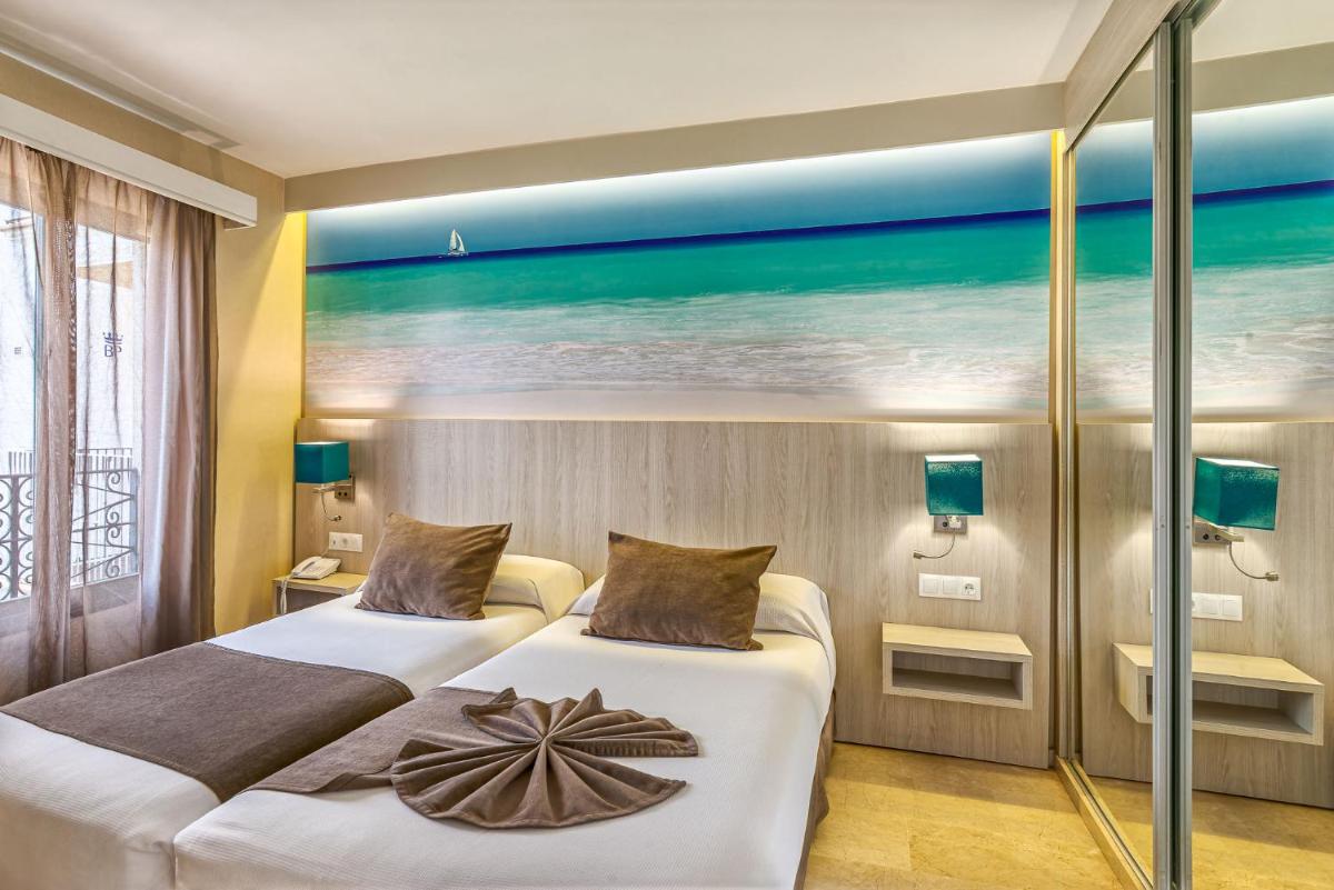 Cama o camas de una habitación en Benalmadena Palace Spa