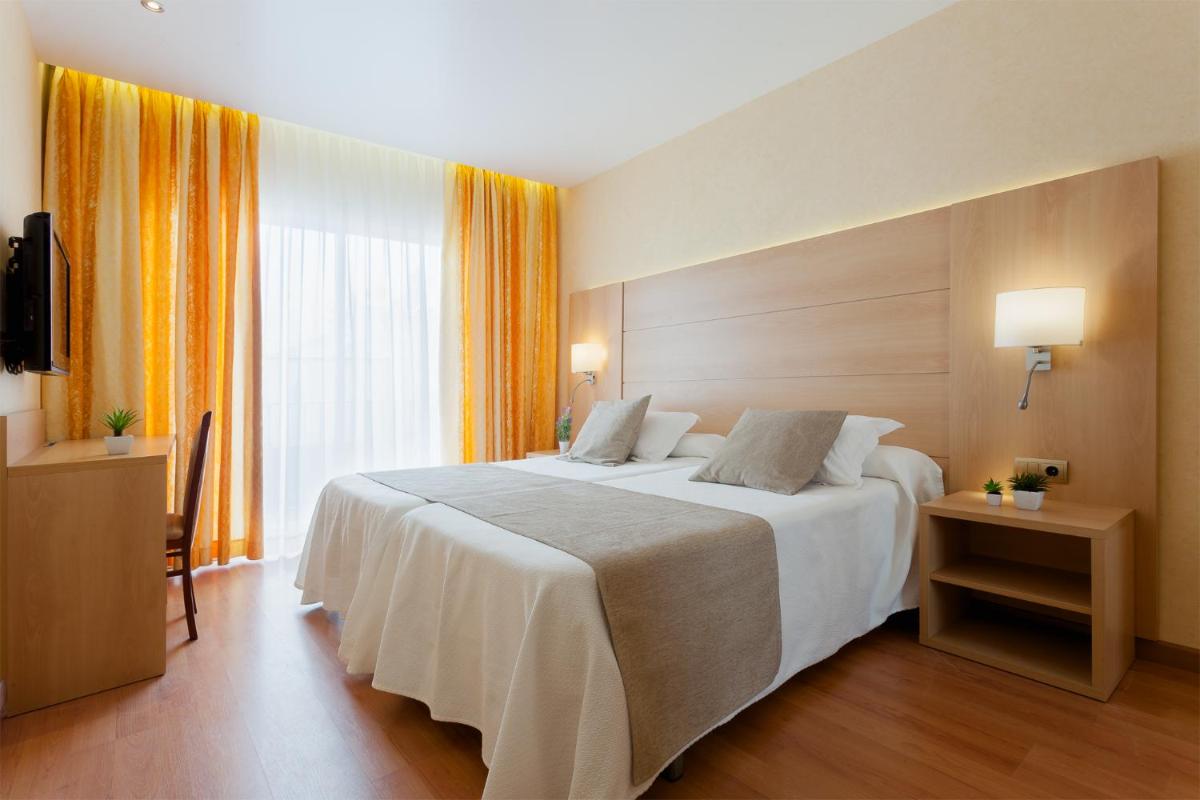 Cama o camas de una habitación en Hotel Pimar & Spa