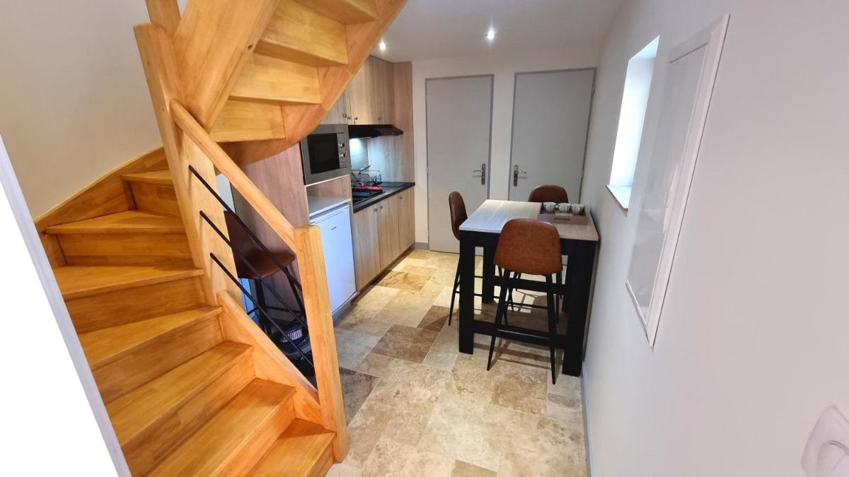 Cuisine ou kitchenette dans l'établissement Logis Hotel Archambeau