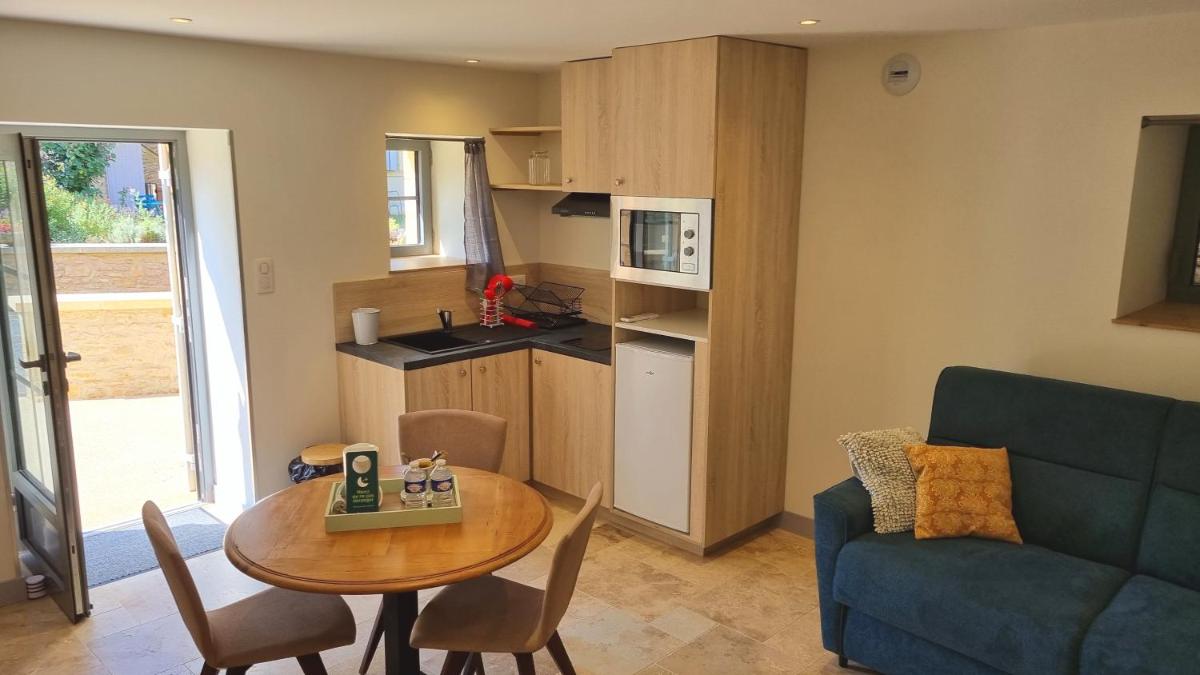 Cuisine ou kitchenette dans l'établissement Logis Hotel Archambeau