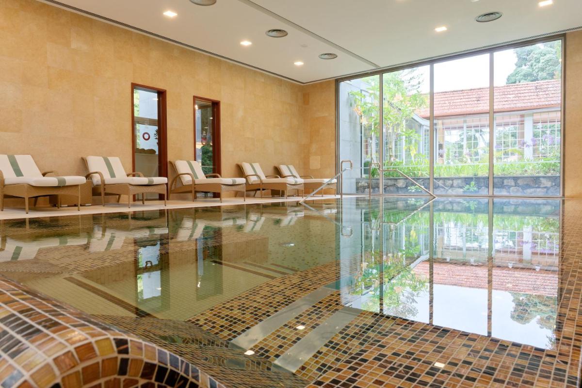 A piscina em ou perto de Casa Velha do Palheiro Relais & Chateaux