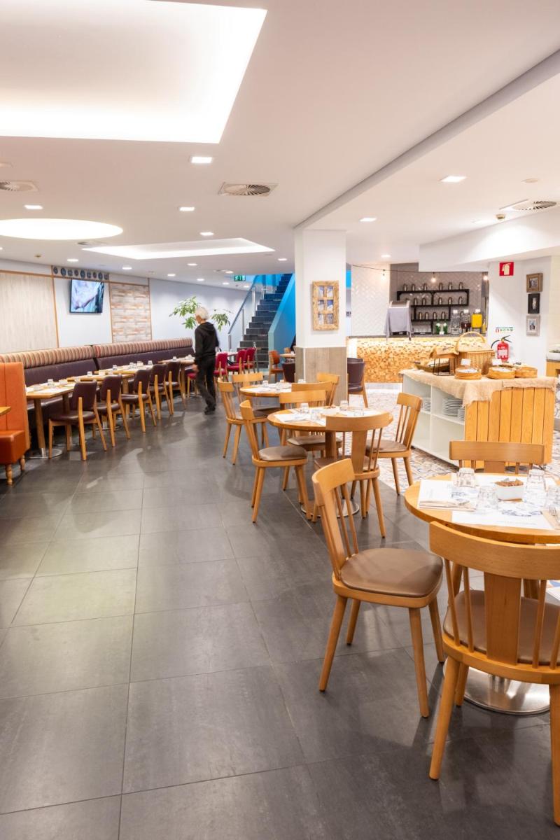 Um restaurante ou outro lugar para comer em Monchique Resort & Spa