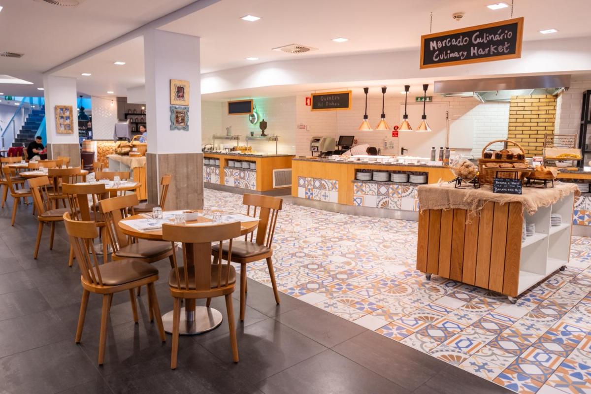 Um restaurante ou outro lugar para comer em Monchique Resort & Spa