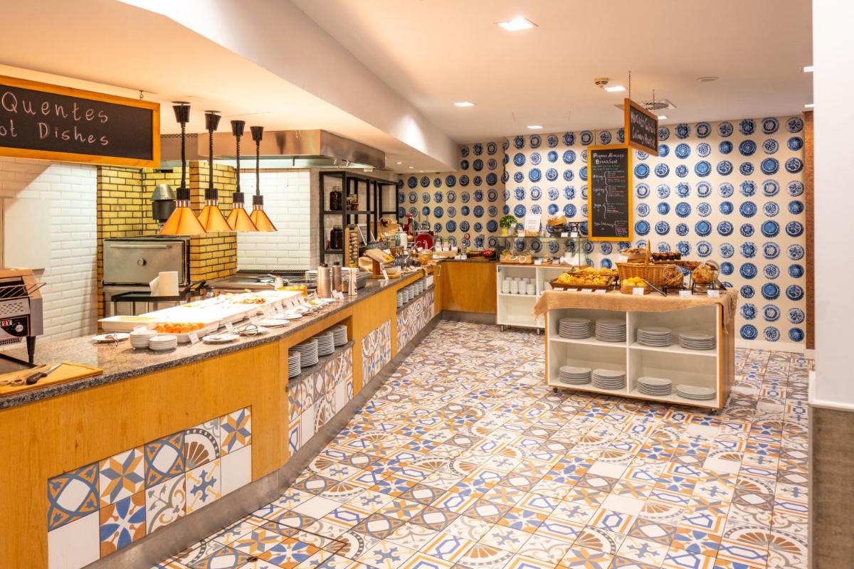 A cozinha ou kitchenette de Monchique Resort & Spa