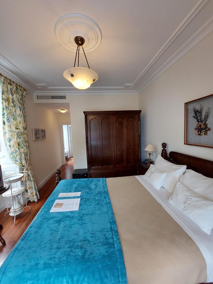 Uma cama ou camas num quarto em Estalagem do Vale