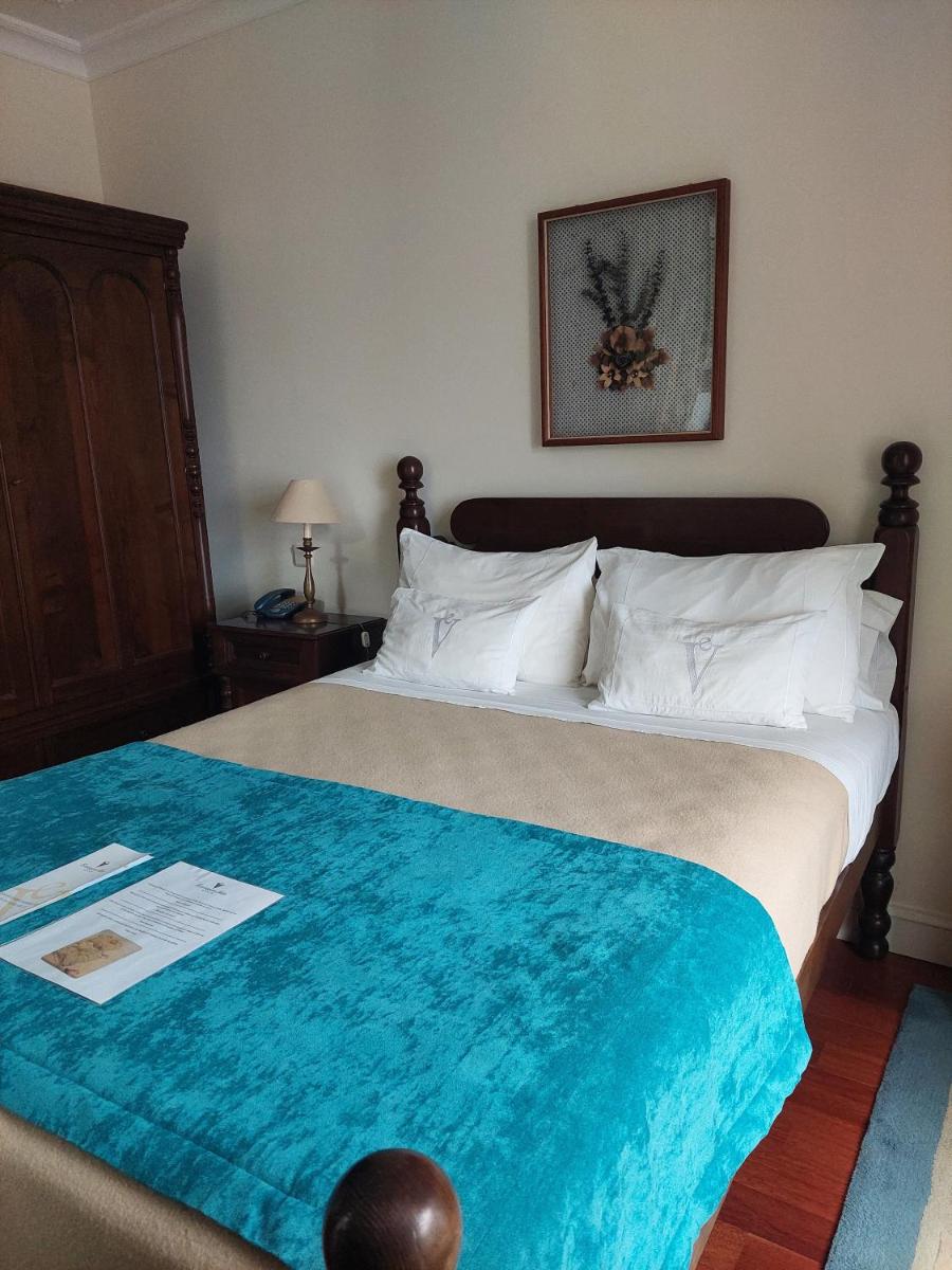 Uma cama ou camas num quarto em Estalagem do Vale
