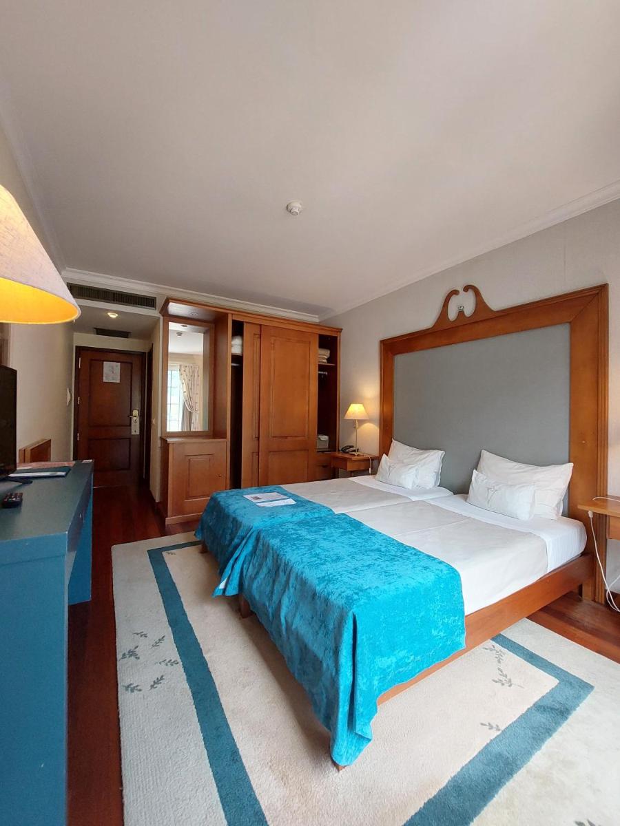 Uma cama ou camas num quarto em Estalagem do Vale