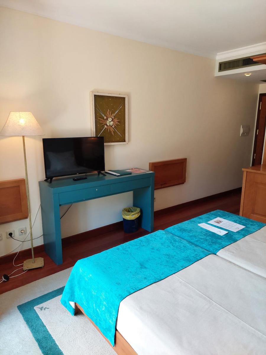 Uma cama ou camas num quarto em Estalagem do Vale