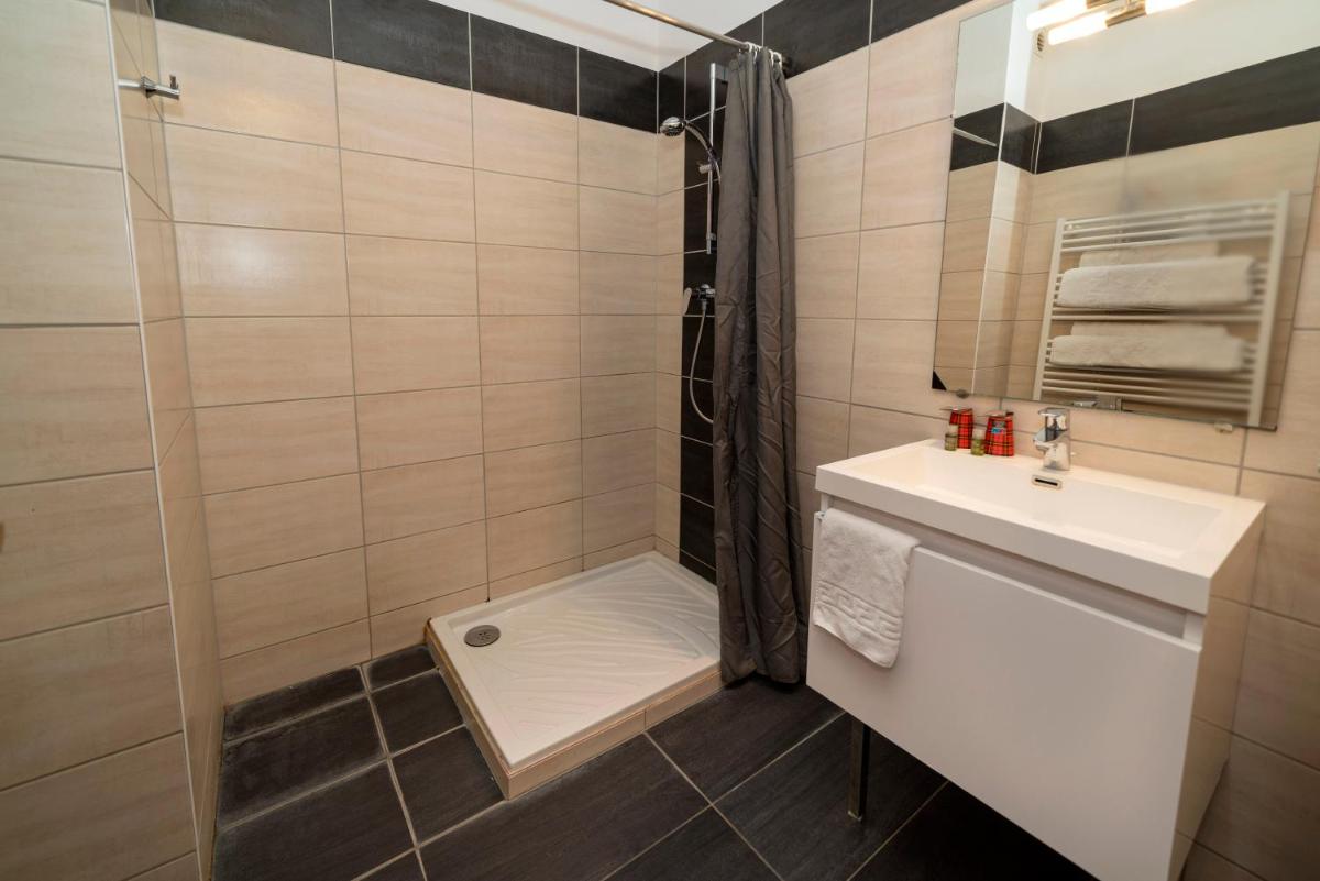 Salle de bains dans l'établissement Alexain Hotel Restaurant & Wellness - Colmar Ouest