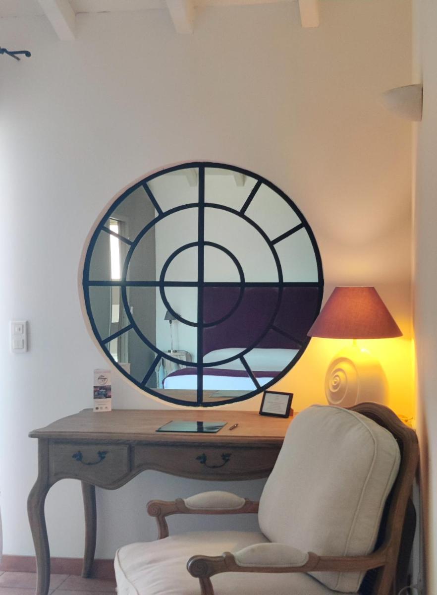 Coin salon dans l'établissement Le Roc E Fiori Hotel - Teritoria