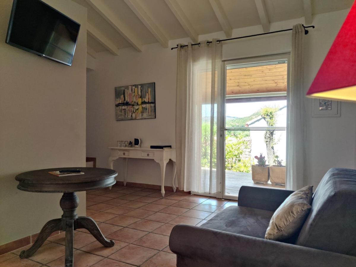 Télévision ou salle de divertissement dans l'établissement Le Roc E Fiori Hotel - Teritoria