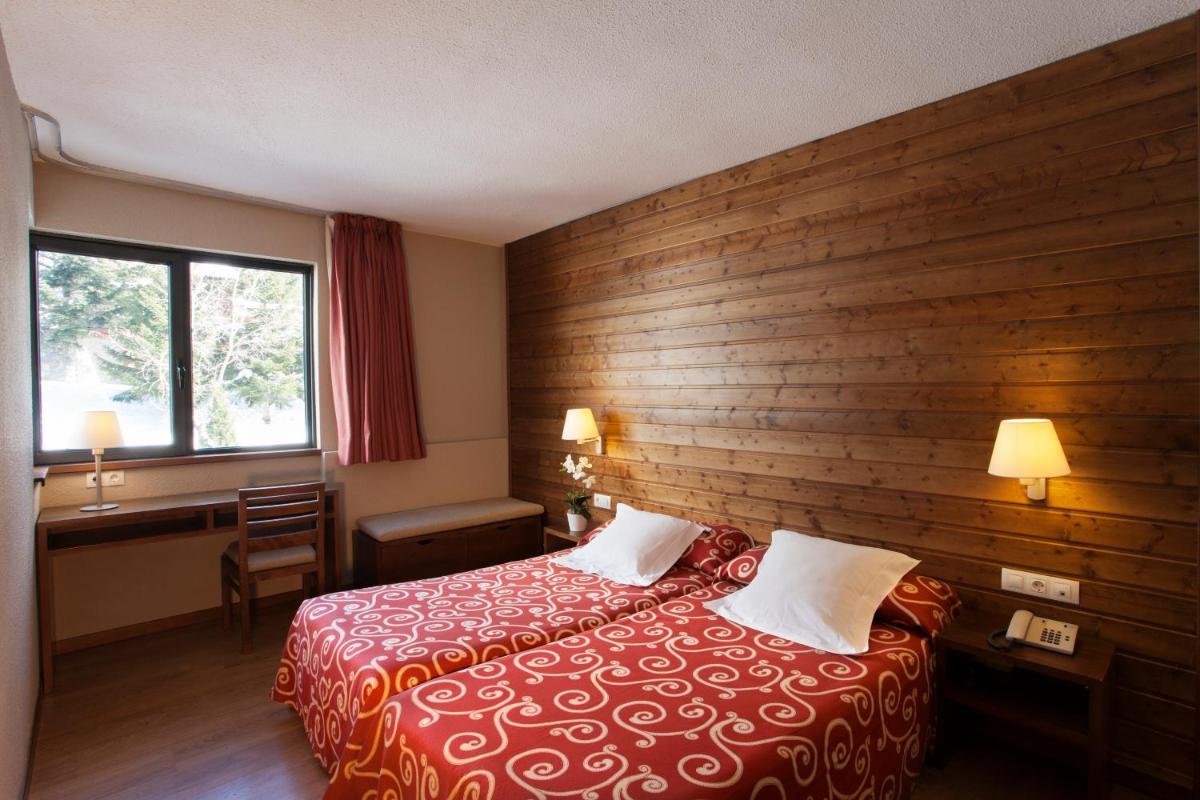 Cama o camas de una habitación en Tuc Blanc