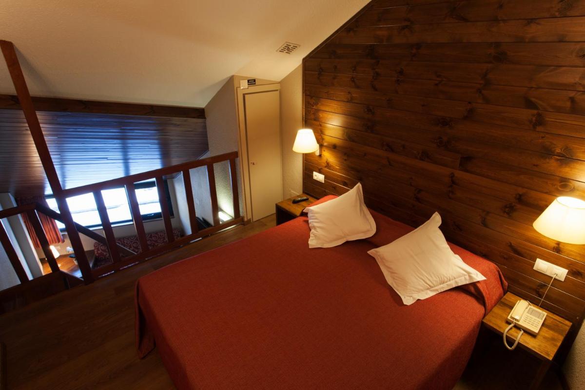 Cama o camas de una habitación en Tuc Blanc