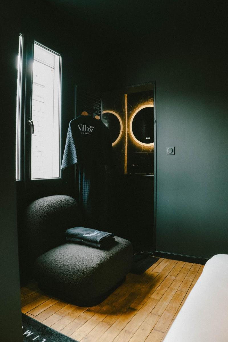 Coin salon dans l'établissement Villa37