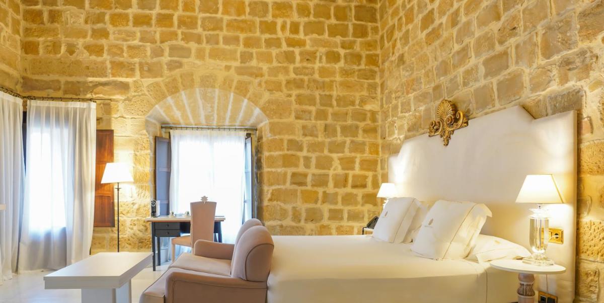 Cama o camas de una habitación en Hotel Palacio De Úbeda 5 G.L