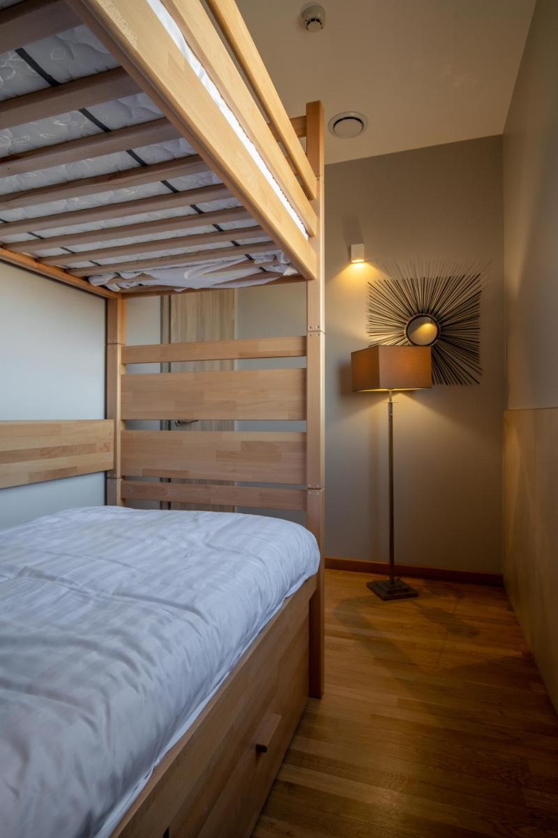 Un ou plusieurs lits dans un hébergement de l'établissement Kyriad Prestige Lyon Est - Saint Priest Eurexpo Hotel and SPA