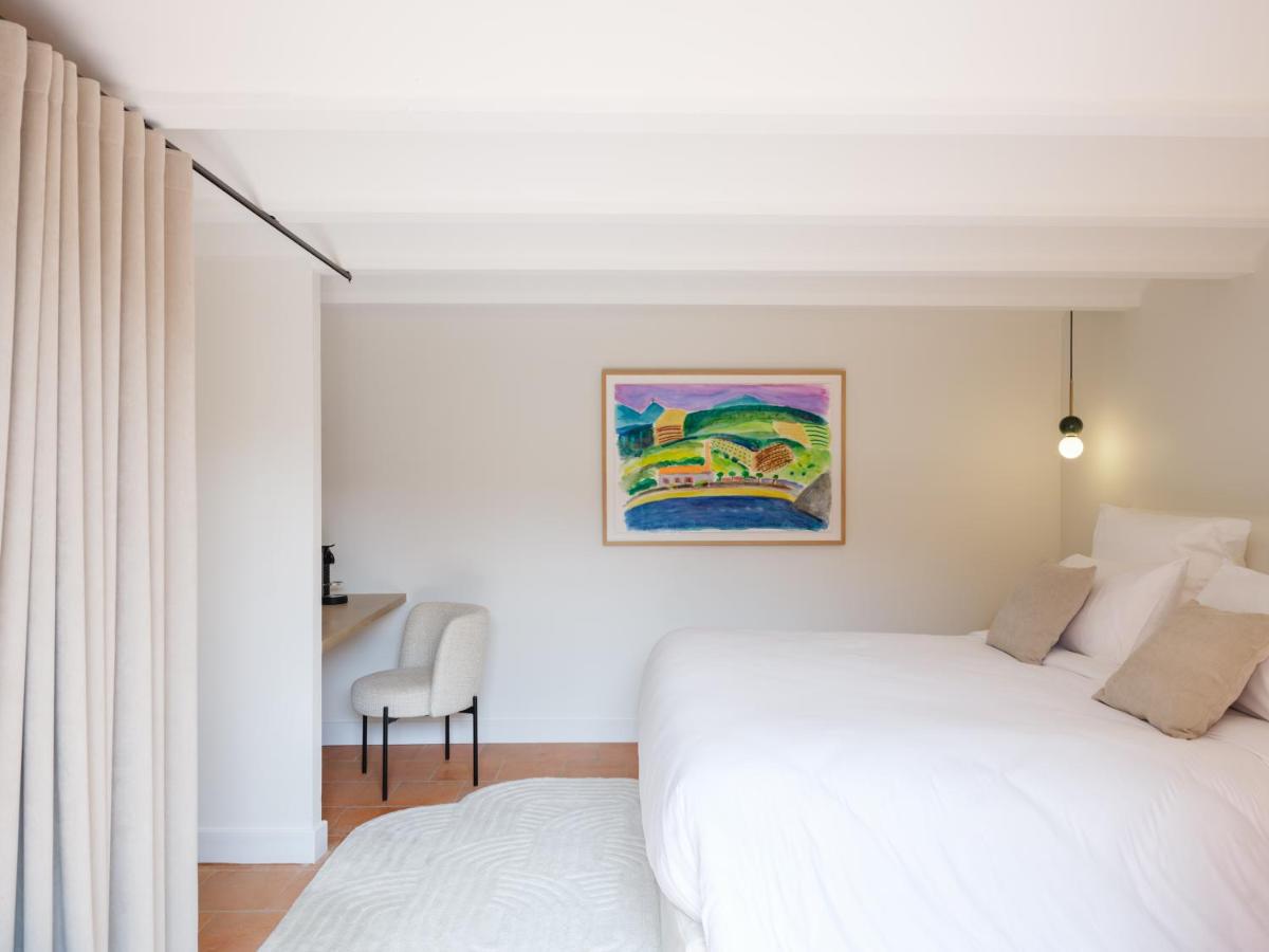 Un ou plusieurs lits dans un hébergement de l'établissement Maison Nova - Boutique Hôtel & Spa