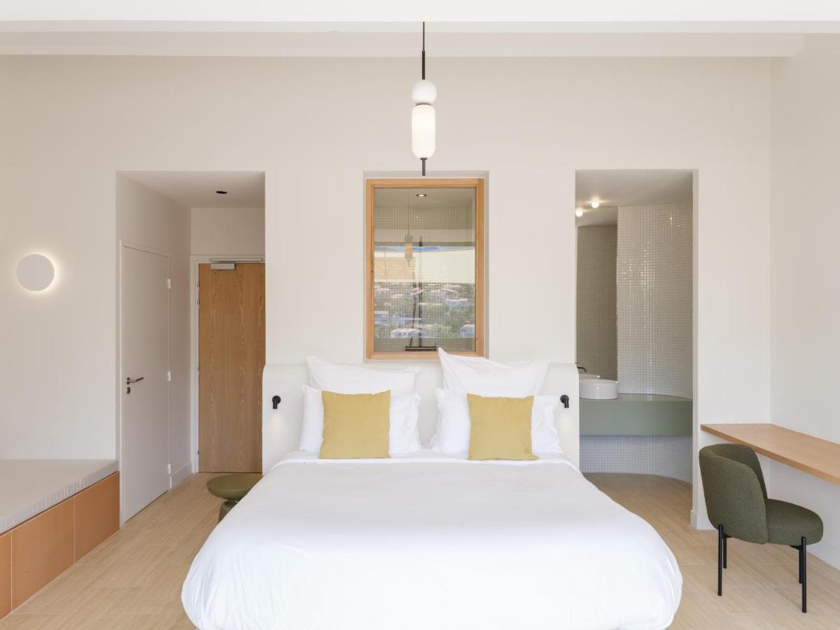 Un ou plusieurs lits dans un hébergement de l'établissement Maison Nova - Boutique Hôtel & Spa
