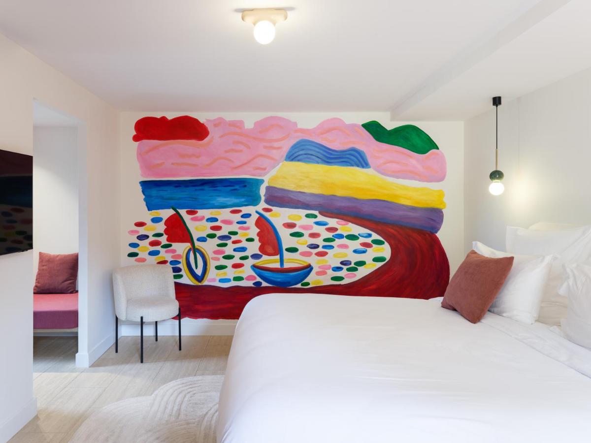 Un ou plusieurs lits dans un hébergement de l'établissement Maison Nova - Boutique Hôtel & Spa