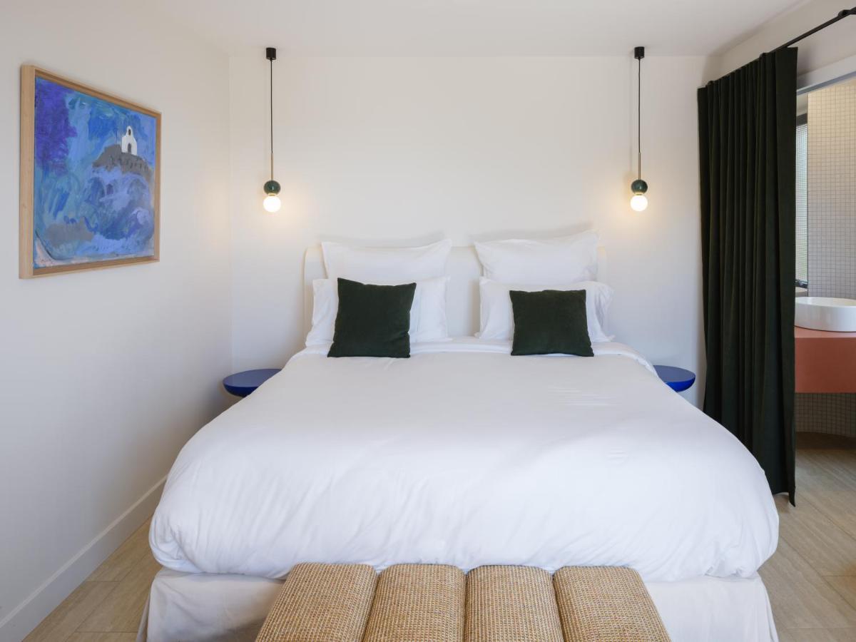 Un ou plusieurs lits dans un hébergement de l'établissement Maison Nova - Boutique Hôtel & Spa