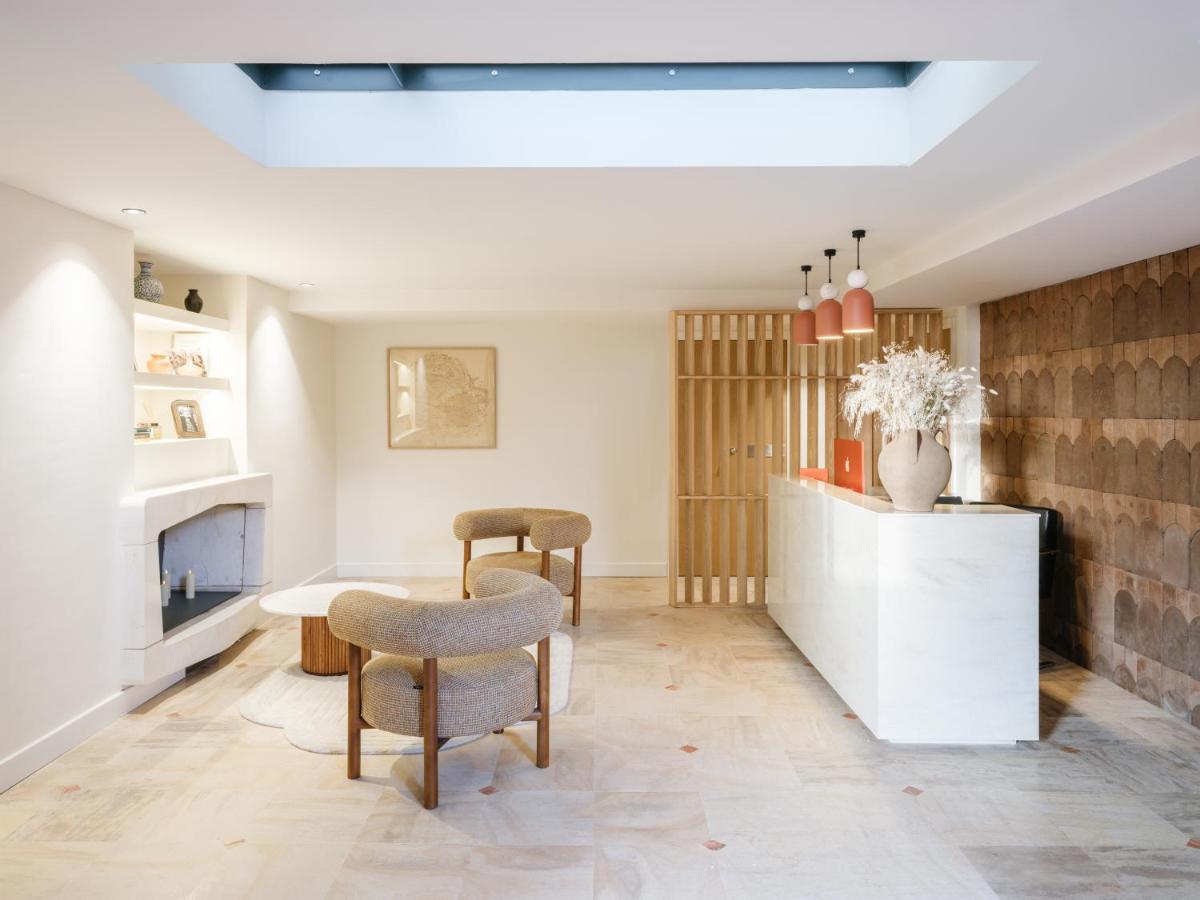 Coin salon dans l'établissement Maison Nova - Boutique Hôtel & Spa