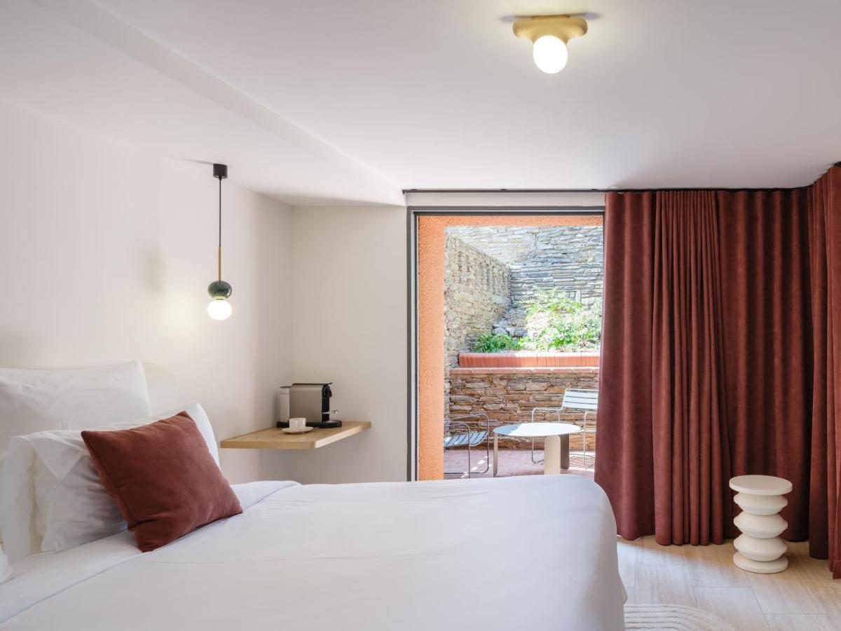 Un ou plusieurs lits dans un hébergement de l'établissement Maison Nova - Boutique Hôtel & Spa