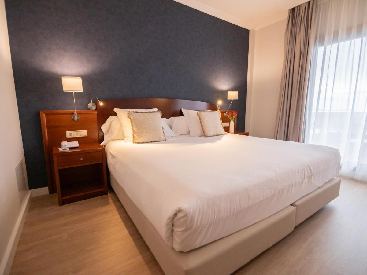 Cama o camas de una habitación en Hotel Spa Galatea