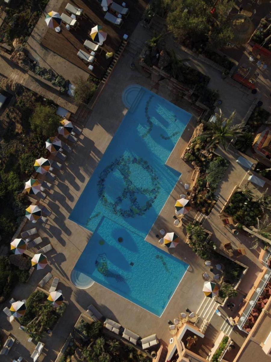 Piscina en o cerca de Bikini Island & Mountain Hotel Es Trenc -Adults only-