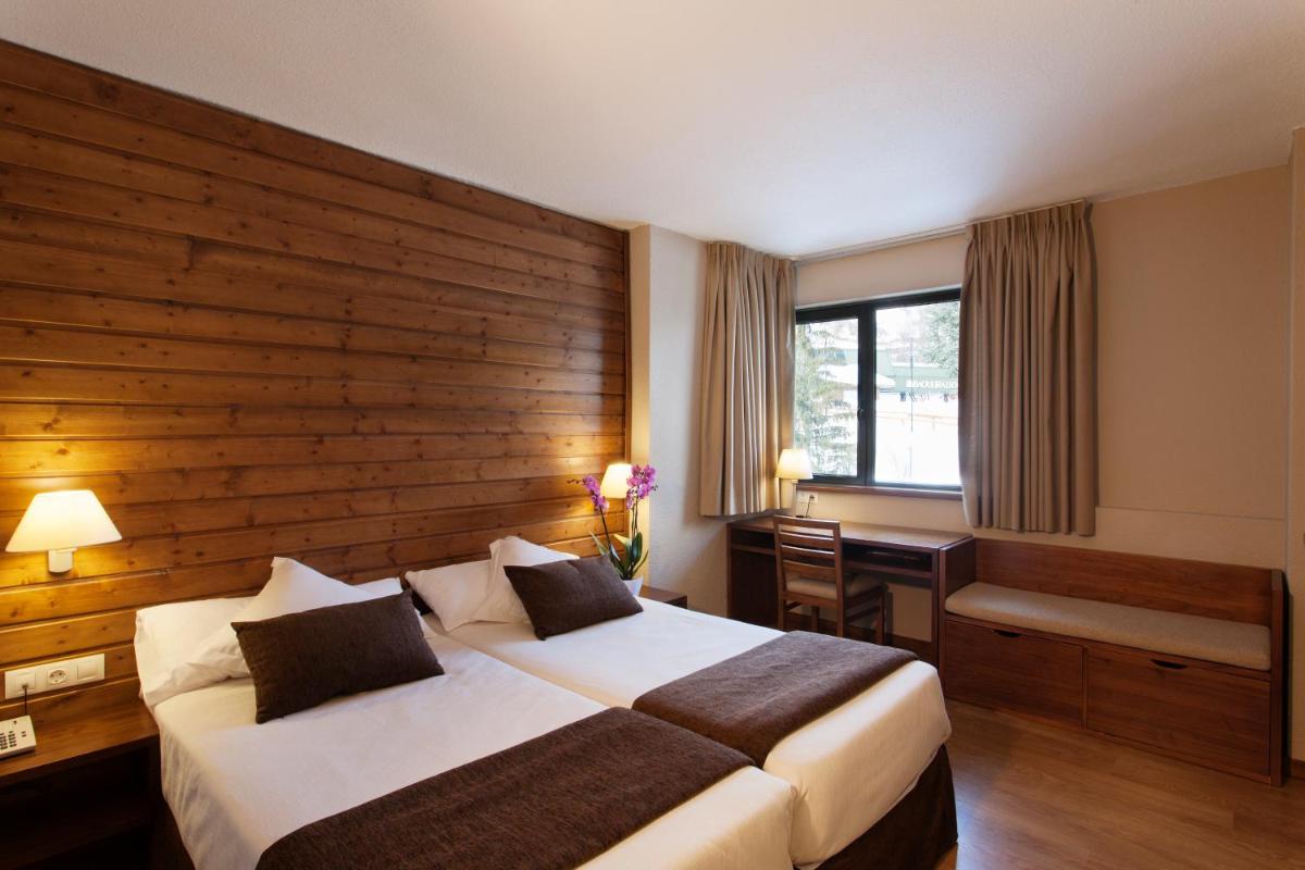 Cama o camas de una habitación en Tuc Blanc