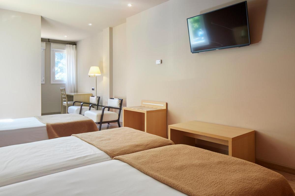 Cama o camas de una habitación en Iraipe Santuario de Arantzazu Hotel