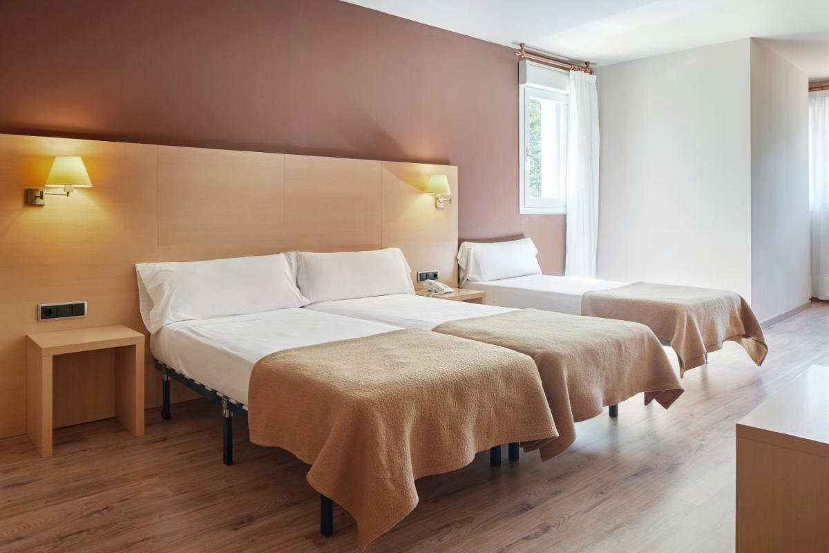 Cama o camas de una habitación en Iraipe Santuario de Arantzazu Hotel