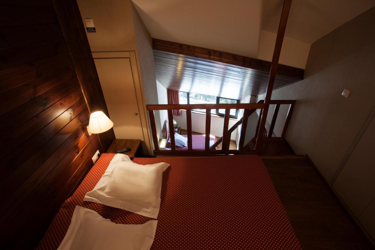 Cama o camas de una habitación en Tuc Blanc