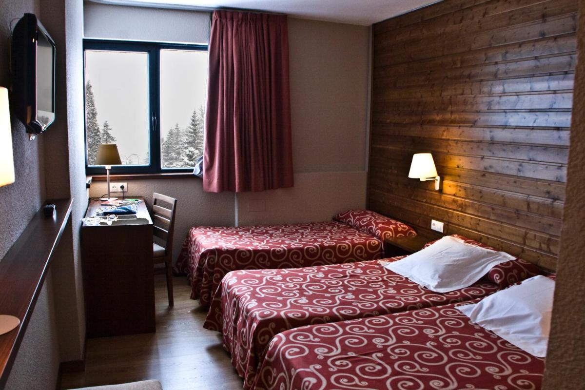 Cama o camas de una habitación en Tuc Blanc