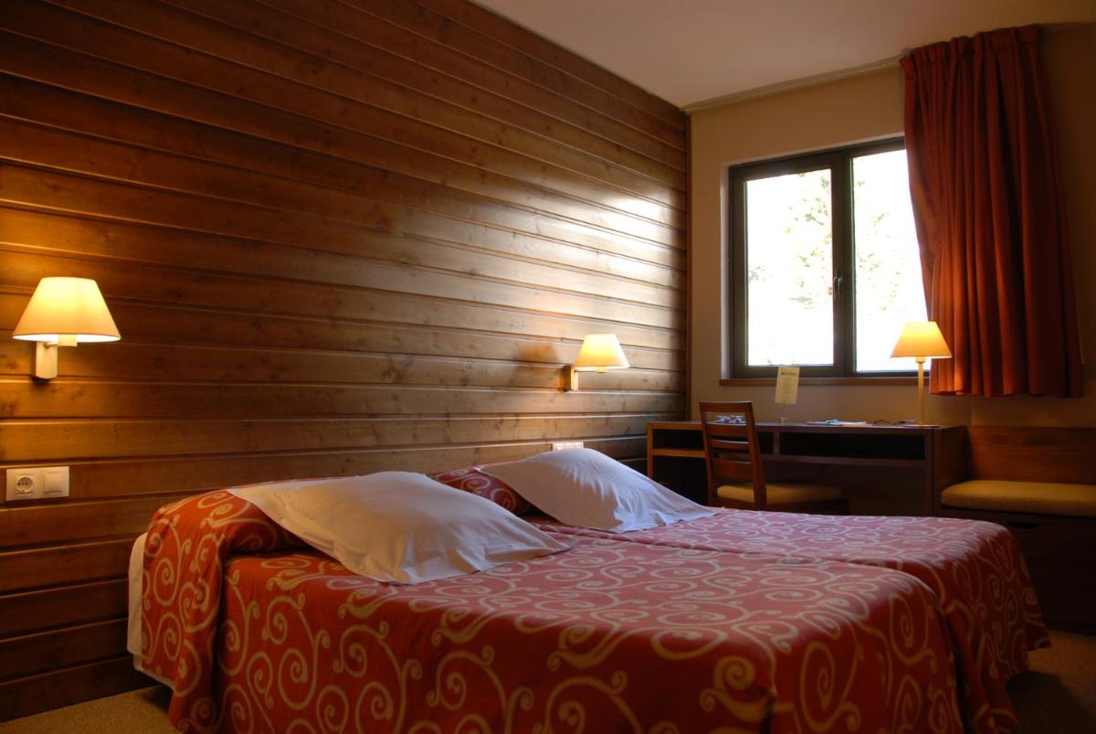 Cama o camas de una habitación en Tuc Blanc