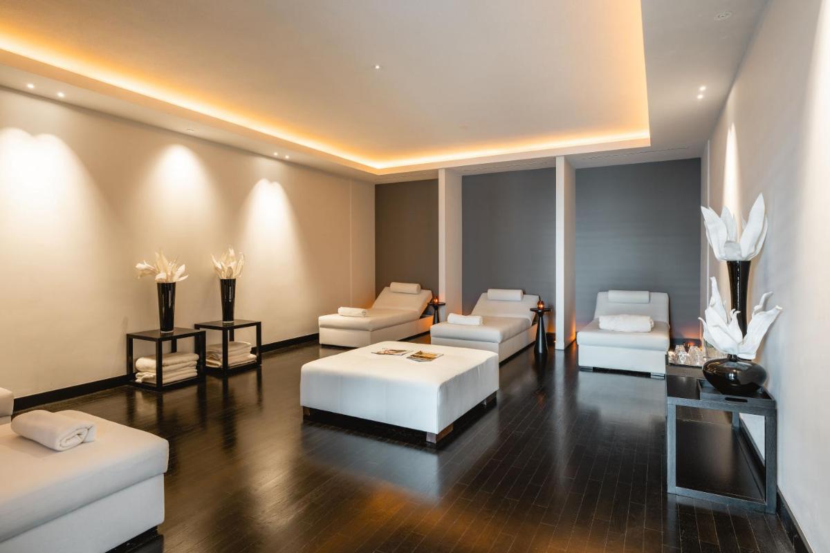 Ein Bett oder Betten in einem Zimmer der Unterkunft A-ROSA Hotel Ceres am Meer - Adults Only