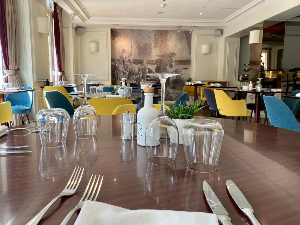 Coin salon dans l'établissement Hôtel de Sèze & Spa Bordeaux Centre