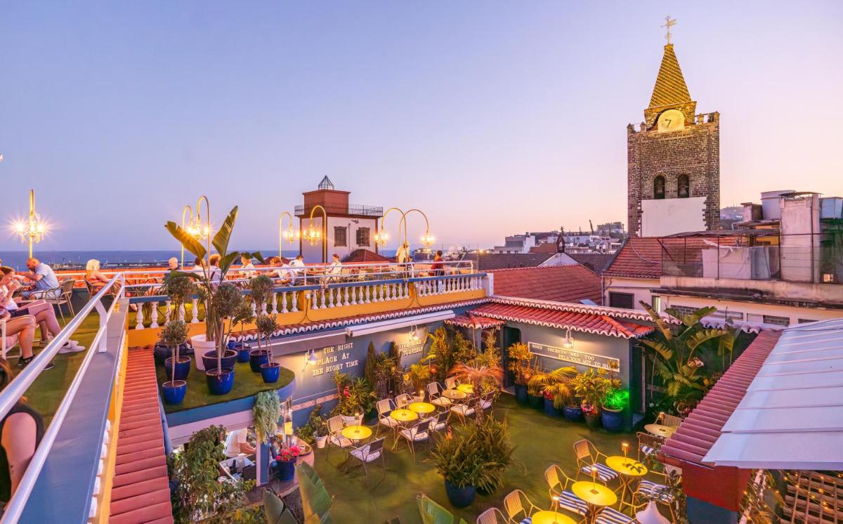 Um restaurante ou outro lugar para comer em Sé Boutique Hotel