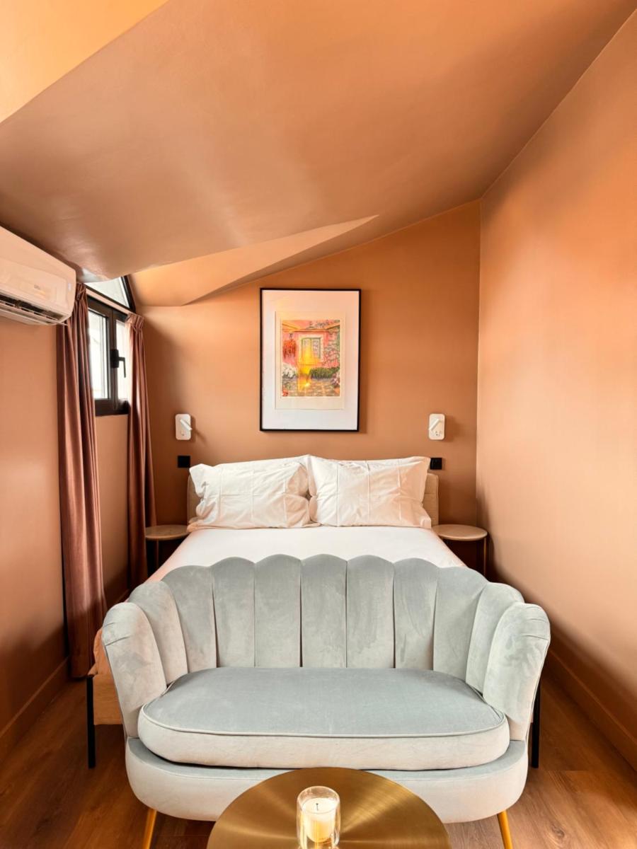 Uma cama ou camas num quarto em Sé Boutique Hotel