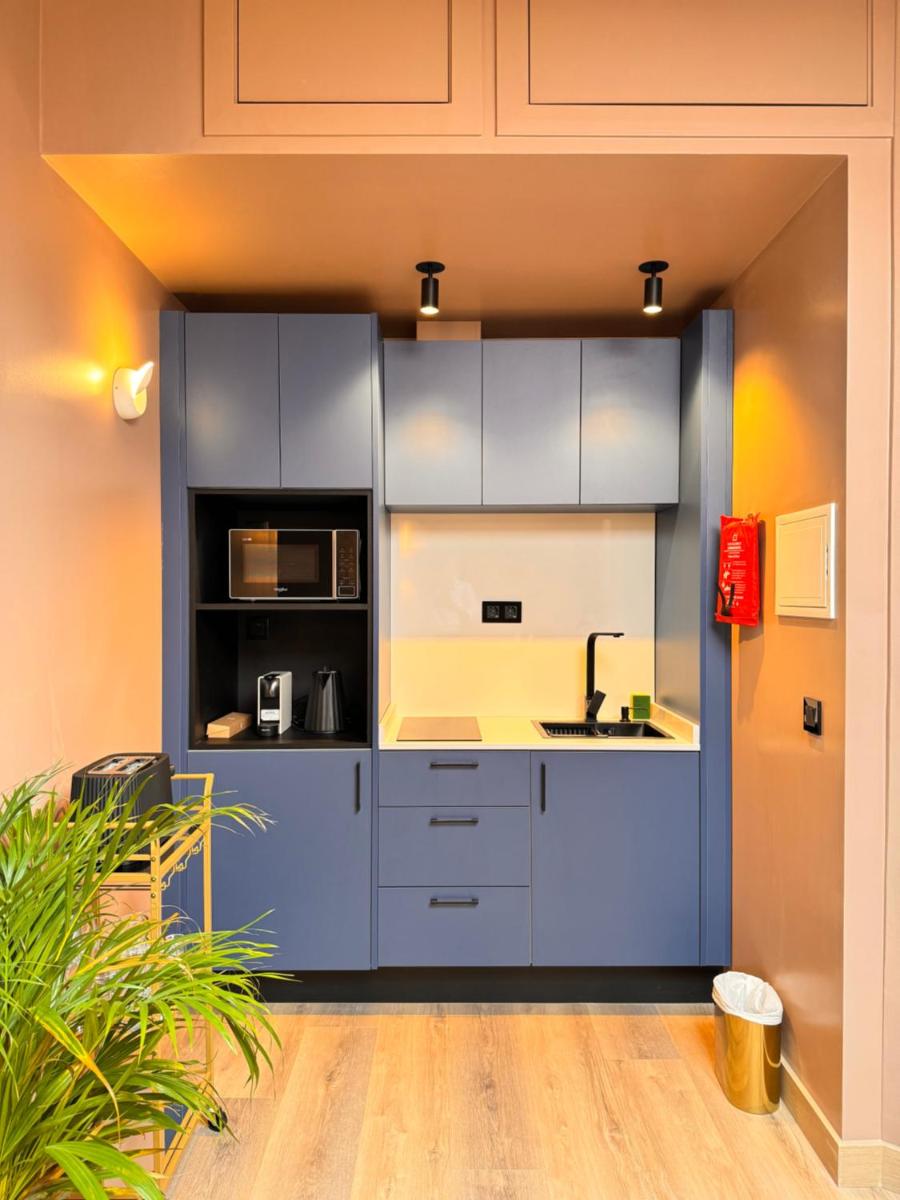A cozinha ou kitchenette de Sé Boutique Hotel