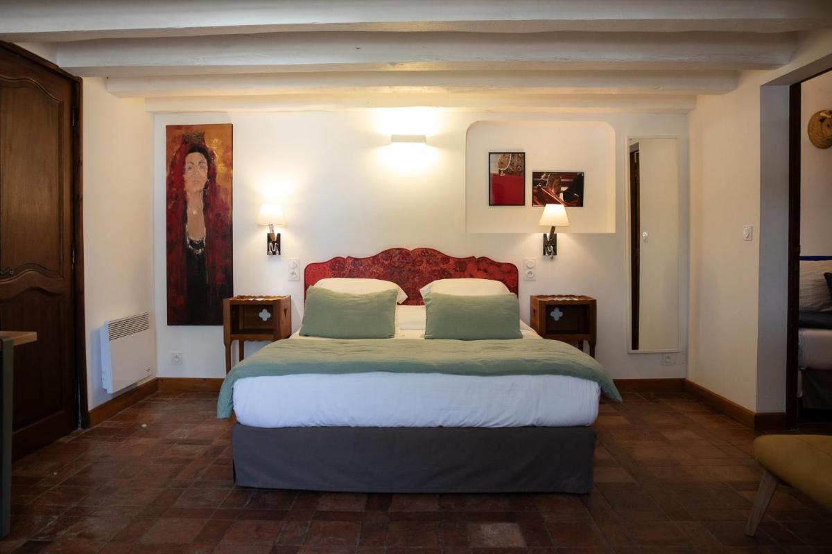 Un ou plusieurs lits dans un hébergement de l'établissement Oustau Camarguen Hôtel & Spa